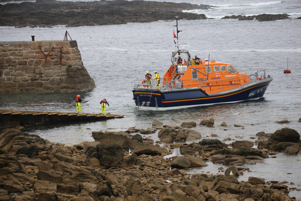 Lifeboat reversing back to the ramp