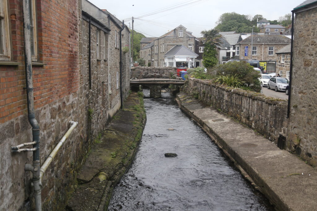 Stream between buildings